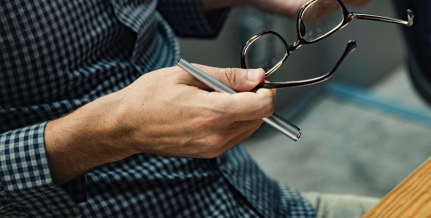 Person with Glasses in Hand