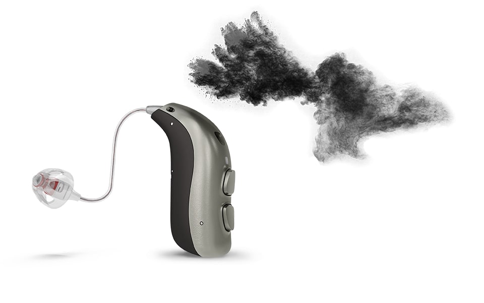 Un appareil auditif de Bernafon à côté d'un nuage de poussière.