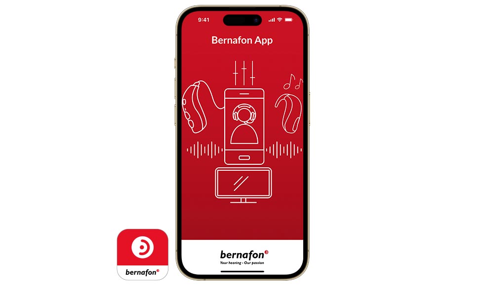 iPhone with red Bernafon App splash screen showing hearing aid connectivity drawing  next to Bernafon app icon.