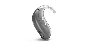 Un ejemplo de los audífonos retroauriculares recargables Philips HearLink mini, también llamados miniBTE T R, de Philips Hearing Solutions